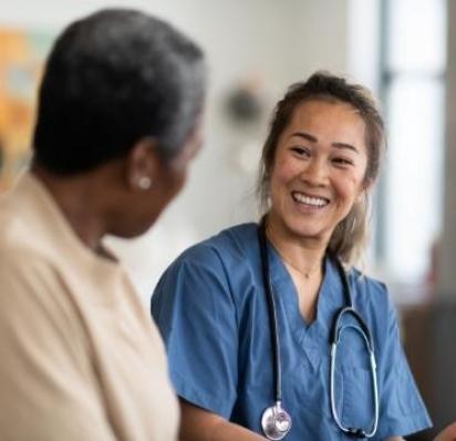 Medical professional smiling at patient