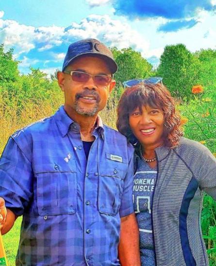 Richard and his wife outside