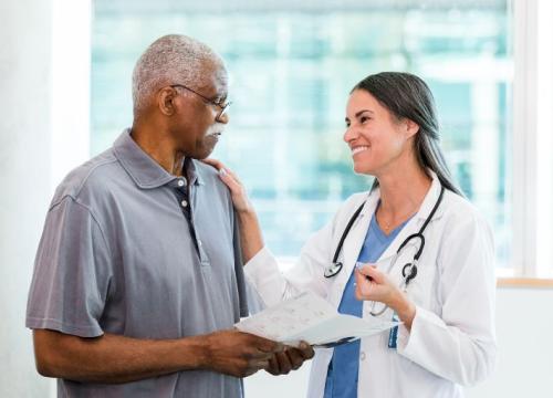 Doctor with an African American patient