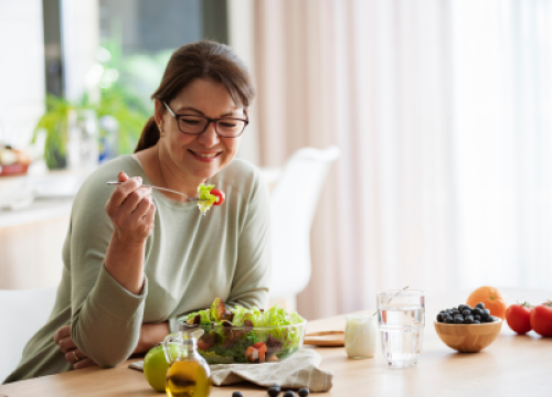 Woman eating a salad