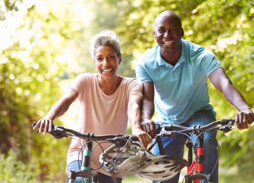 A couple biking together