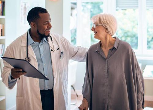 Doctor talking to patient