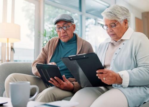 Couple filling out survey together