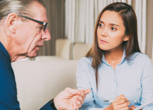 Man talking to therapist