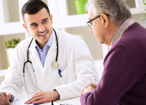 Man talking to his doctor