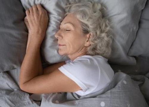 Woman sleeping in bed