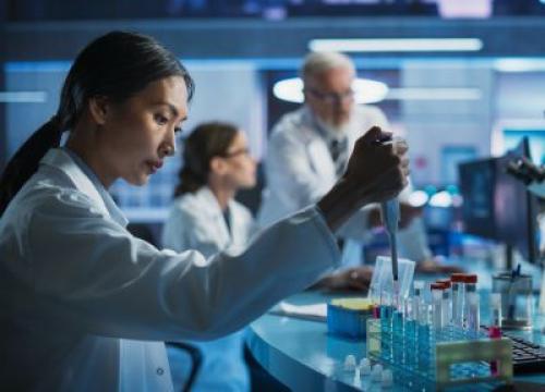 Doctor Working With Test Tubes