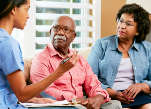 couple talking to medical professional