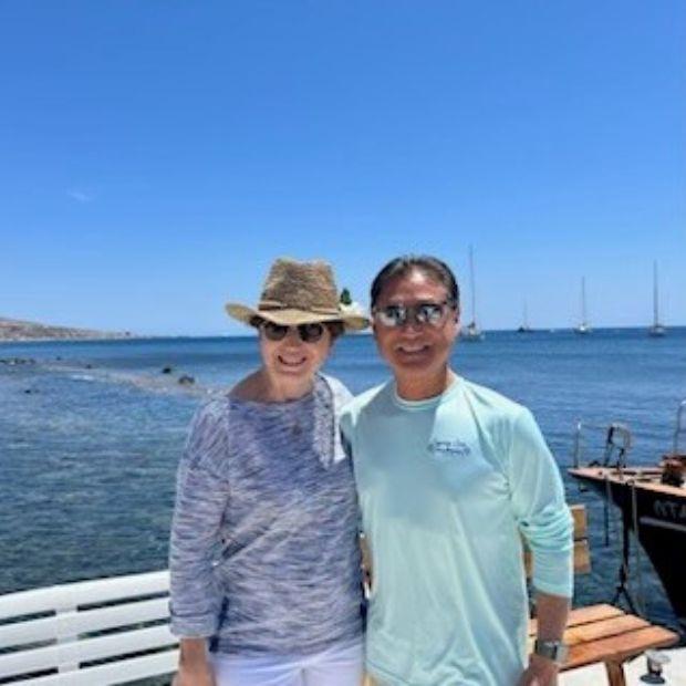 Gil Kim and his wife on vacation