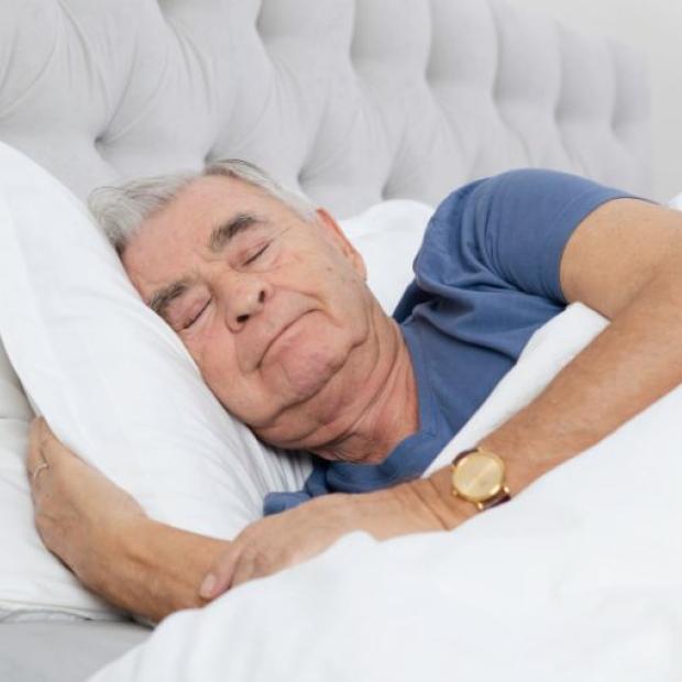 Man sleeping in bed