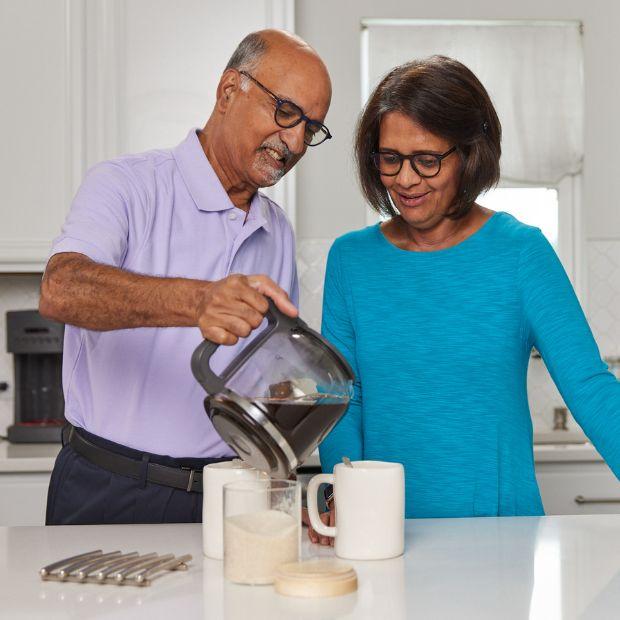 Radhika and Dharma making coffee