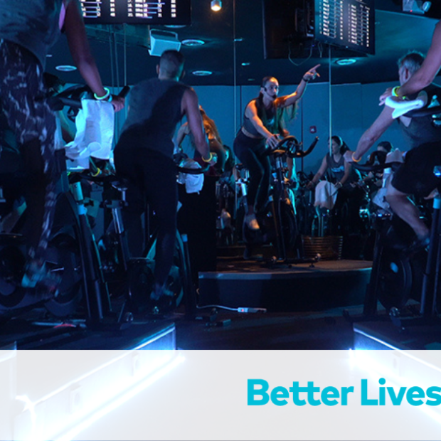 Group of people cycling inside