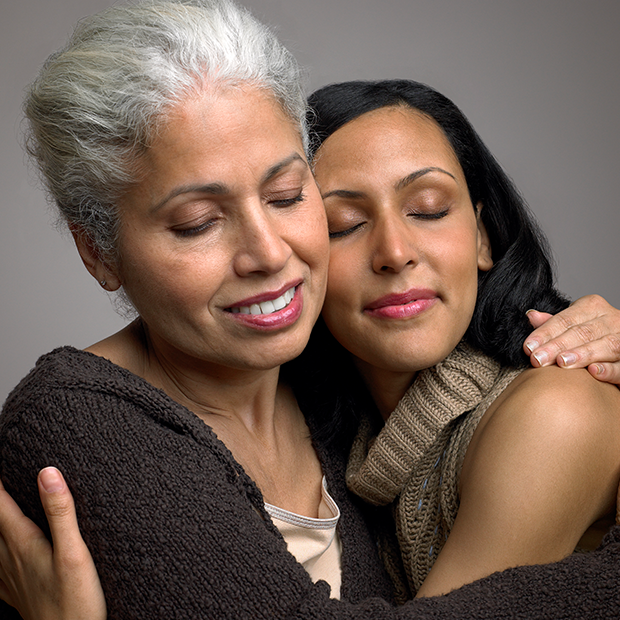 Mother and daughter embracing