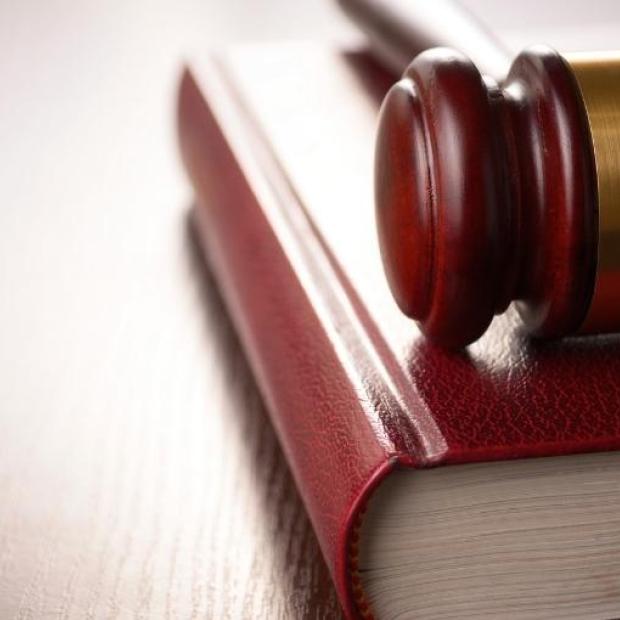 Legal document with gavel and law book