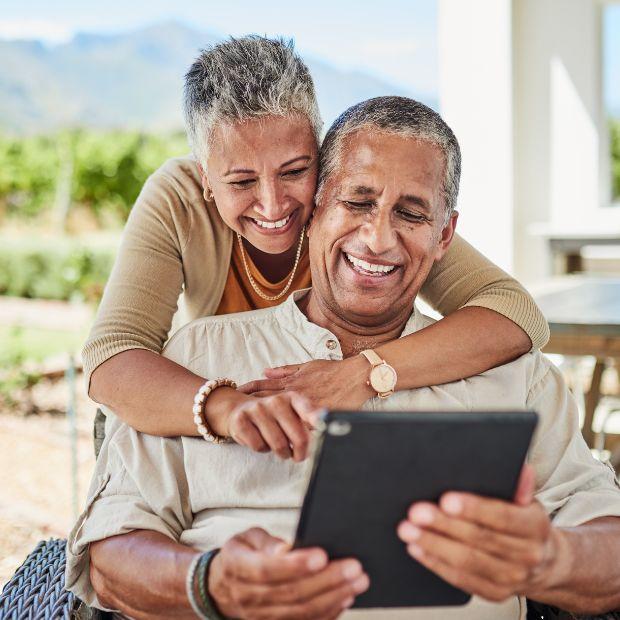 Couple looking at a tablet