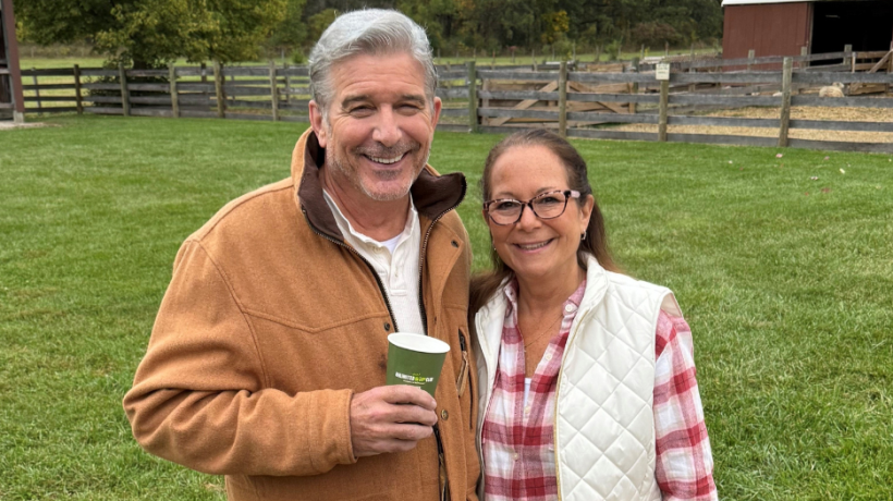 Bob and Deb standing together outside