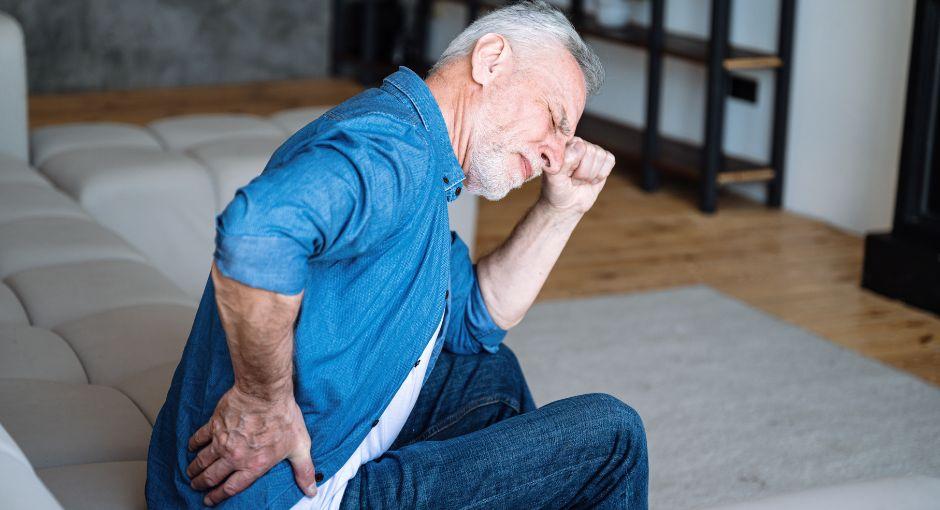 Man holding his back in pain