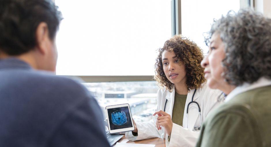 Doctor going over brain scan with patients