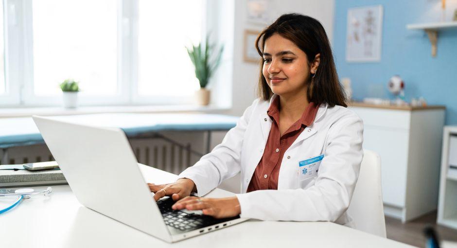 Healthcare professional on a laptop