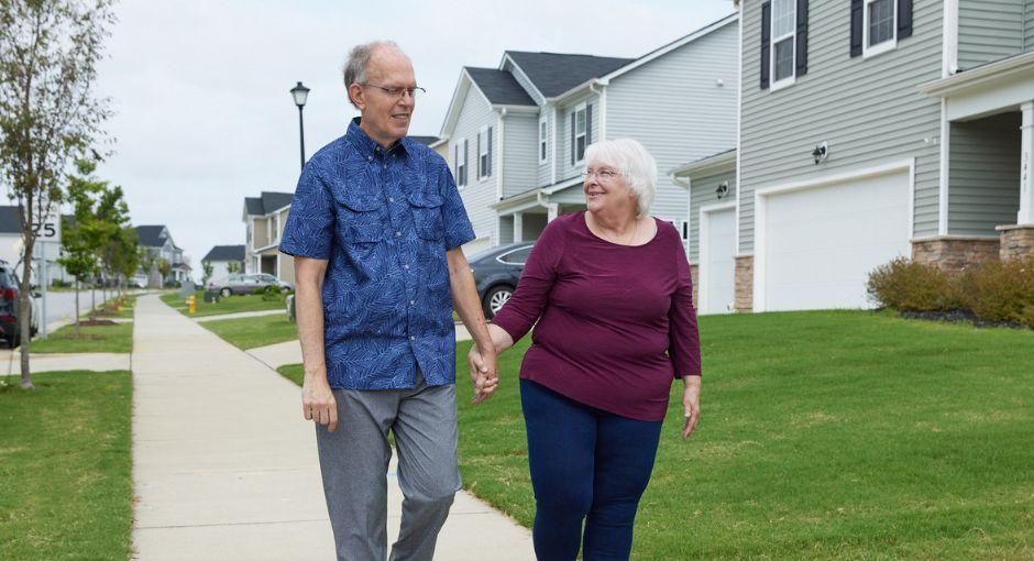 Couple walking in their neighborhood