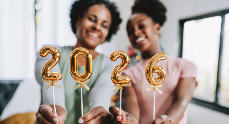 Mother and daughter hold number 2026 new year