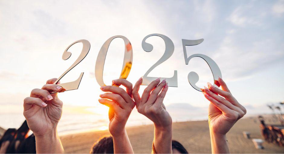 People holding up 2025 sign