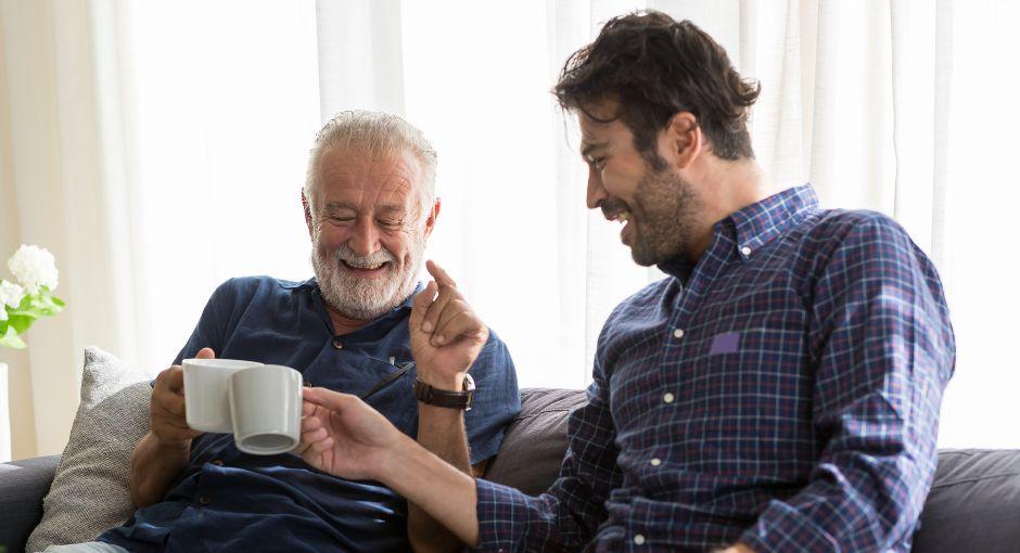 Father and son drinking coffee