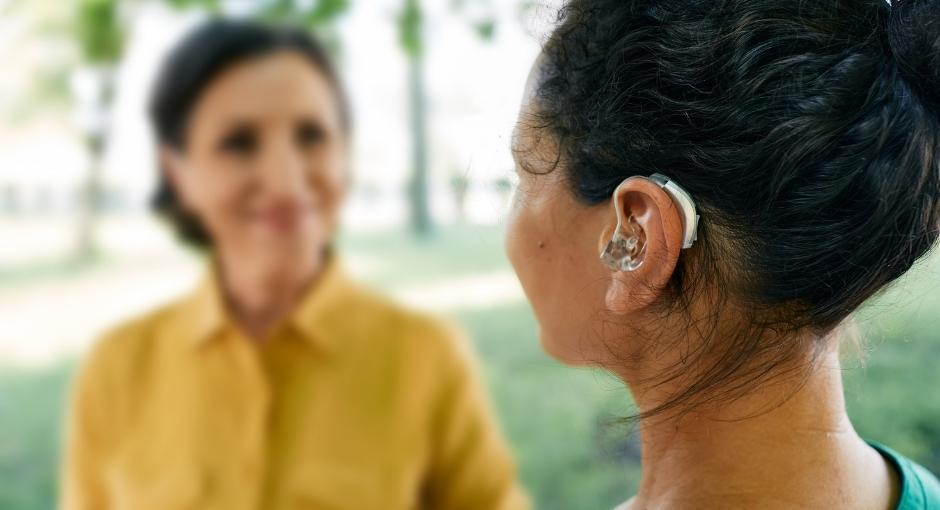 Woman wearing hearing aid