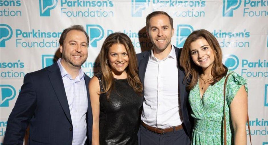 Four family members posing at a PF event