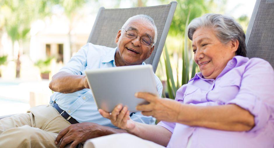 Couple interacting with a tablet