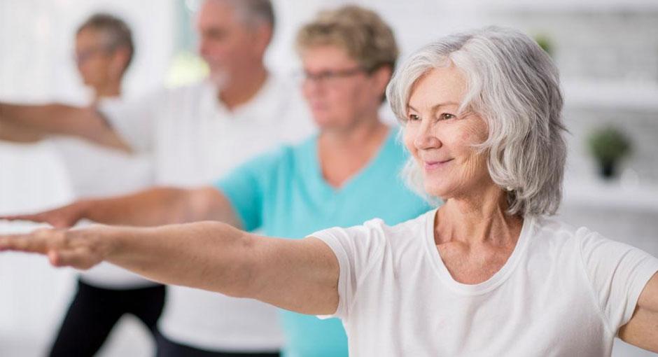 People stretching in a fitness class