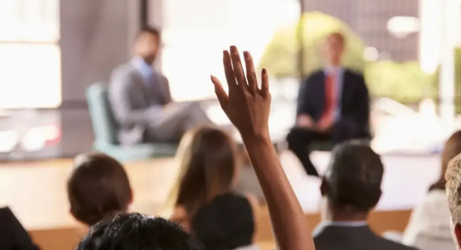 Person raising hand 
