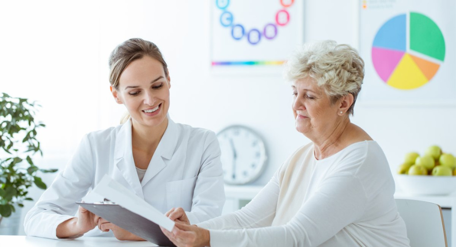 Woman talking with medical professional