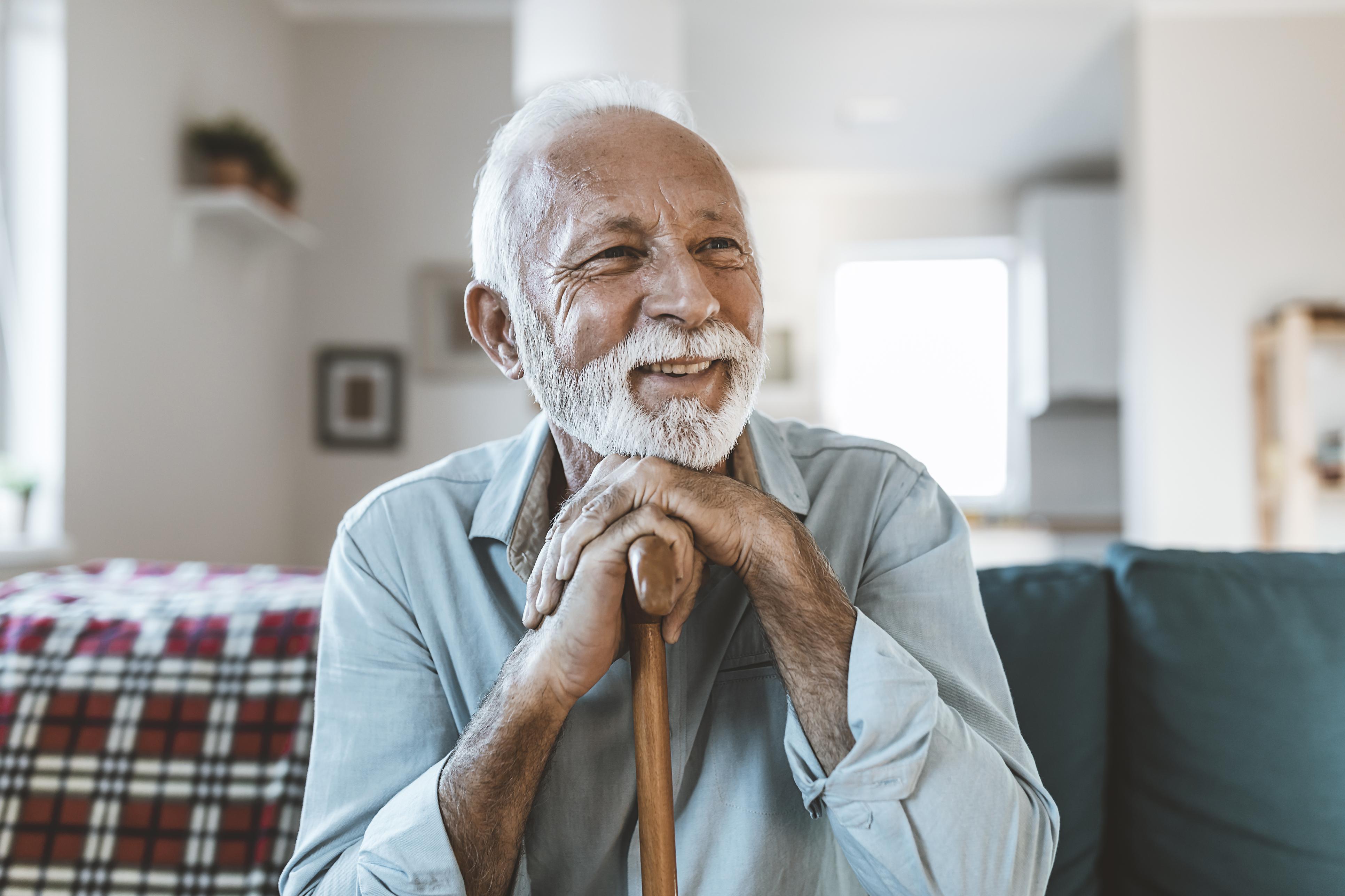 man sitting and smiling