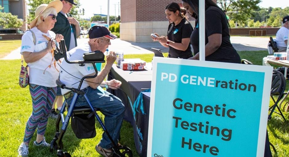 Man at PD GENEration booth at event