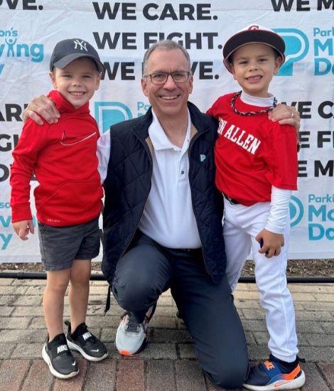 John with family at a Moving Day event