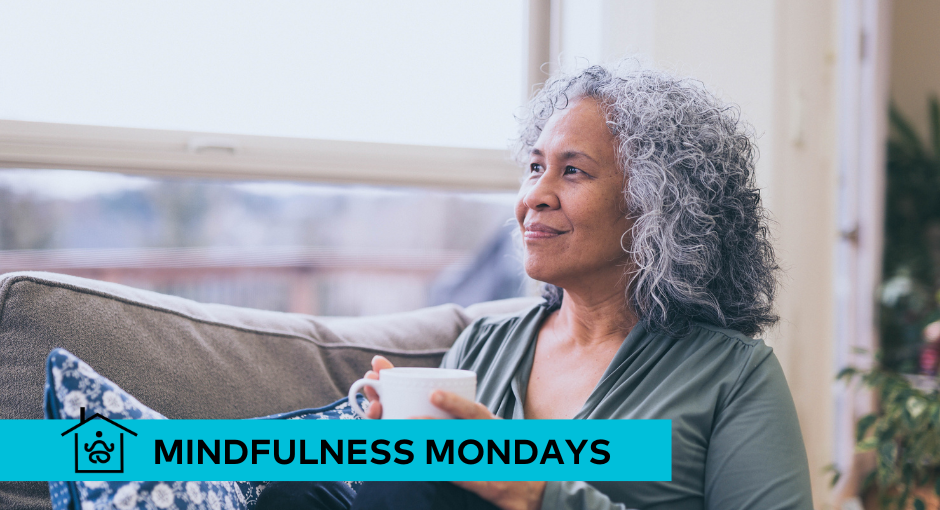 Woman sitting on the couch drinking coffee