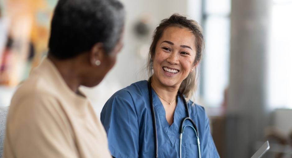 Medical professional smiling at patient