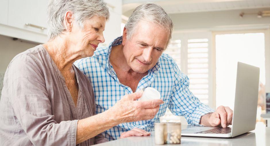 Couple reading pill medications