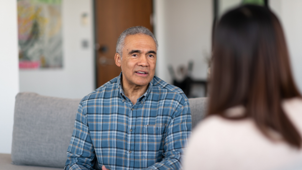 Man talking to therapist