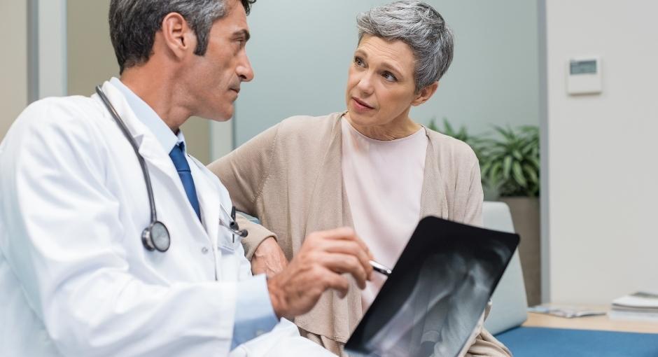 Doctor and patient looking at scan