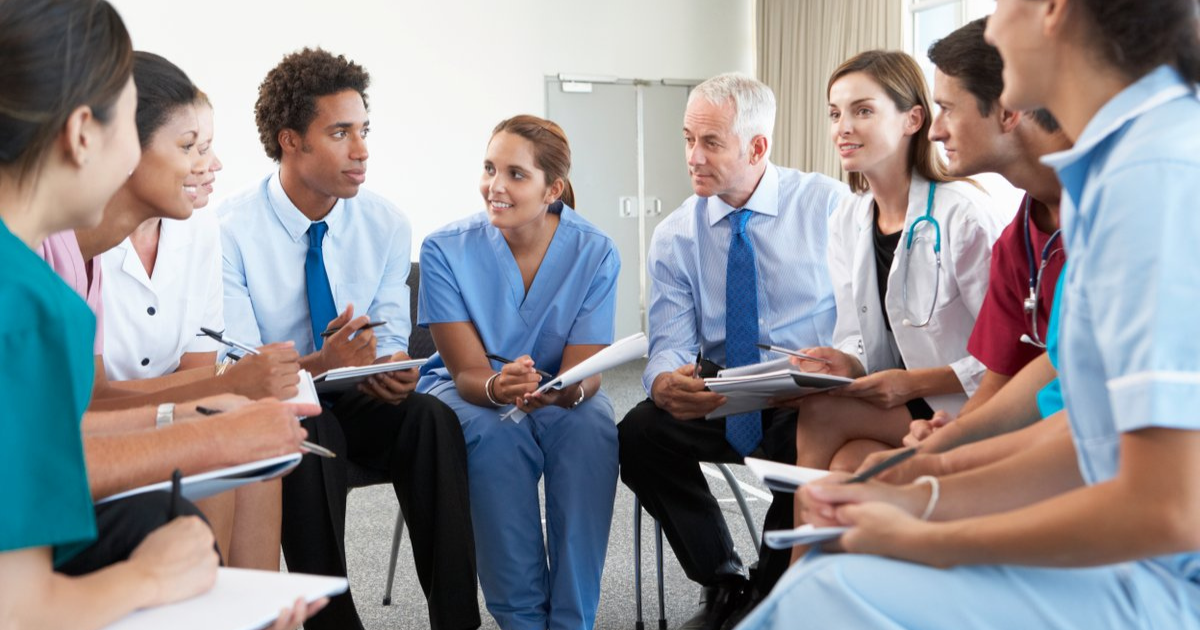 Group of medical professionals talking